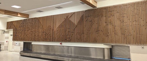 Images in custom millwork pay tribute to the indigenous Native American Waco Tribe.