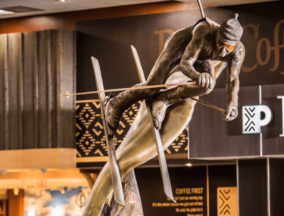 Close-up photo of the bronze Slalom Ski Statue