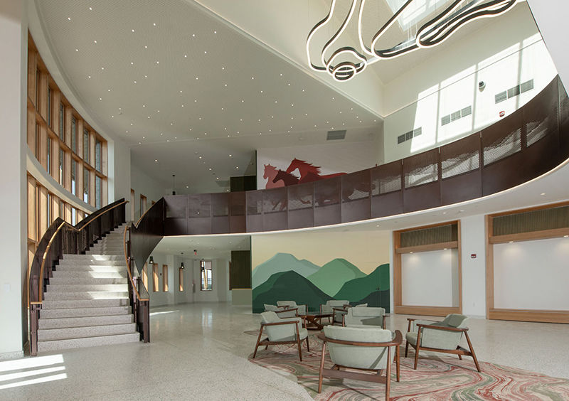 Designers incorporated references to the local horseracing culture and regional landscapes.